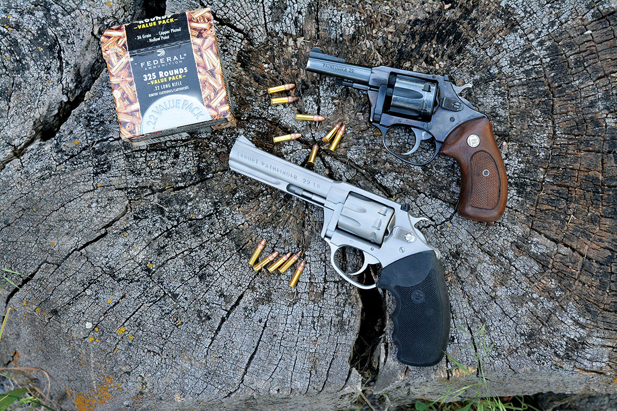 The original Charter Arms Pathfinder in 22 LR (top) was a popular kit gun that carried a modest price. The Target Pathfinder (bottom) shares the same basic double-action/single-action lock work, but is offered in stainless steel and boasts a modest cost.